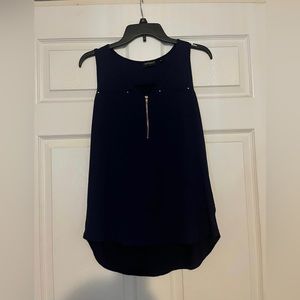 Navy blue tank top, with gold zipper.